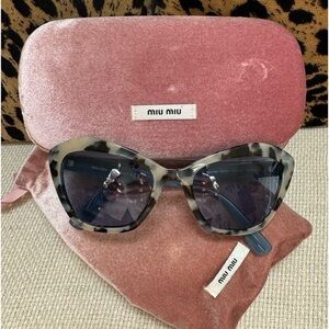 Miu Miu sunglasses in blue and tan. cloth case, hard case & shammy.
